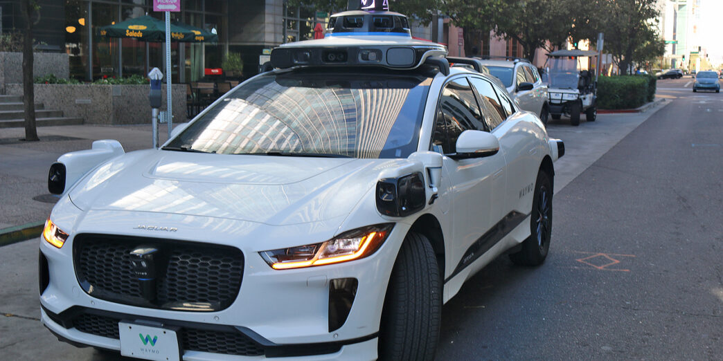 a white car with a light on top