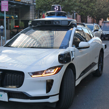a white car with a light on top