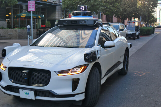 a white car with a light on top