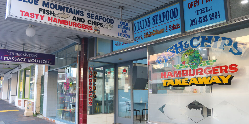 a storefront with signs and signs