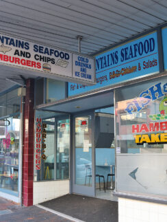 a storefront with signs and signs