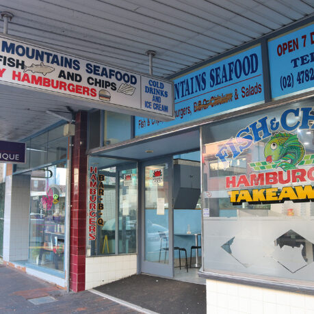 a storefront with signs and signs