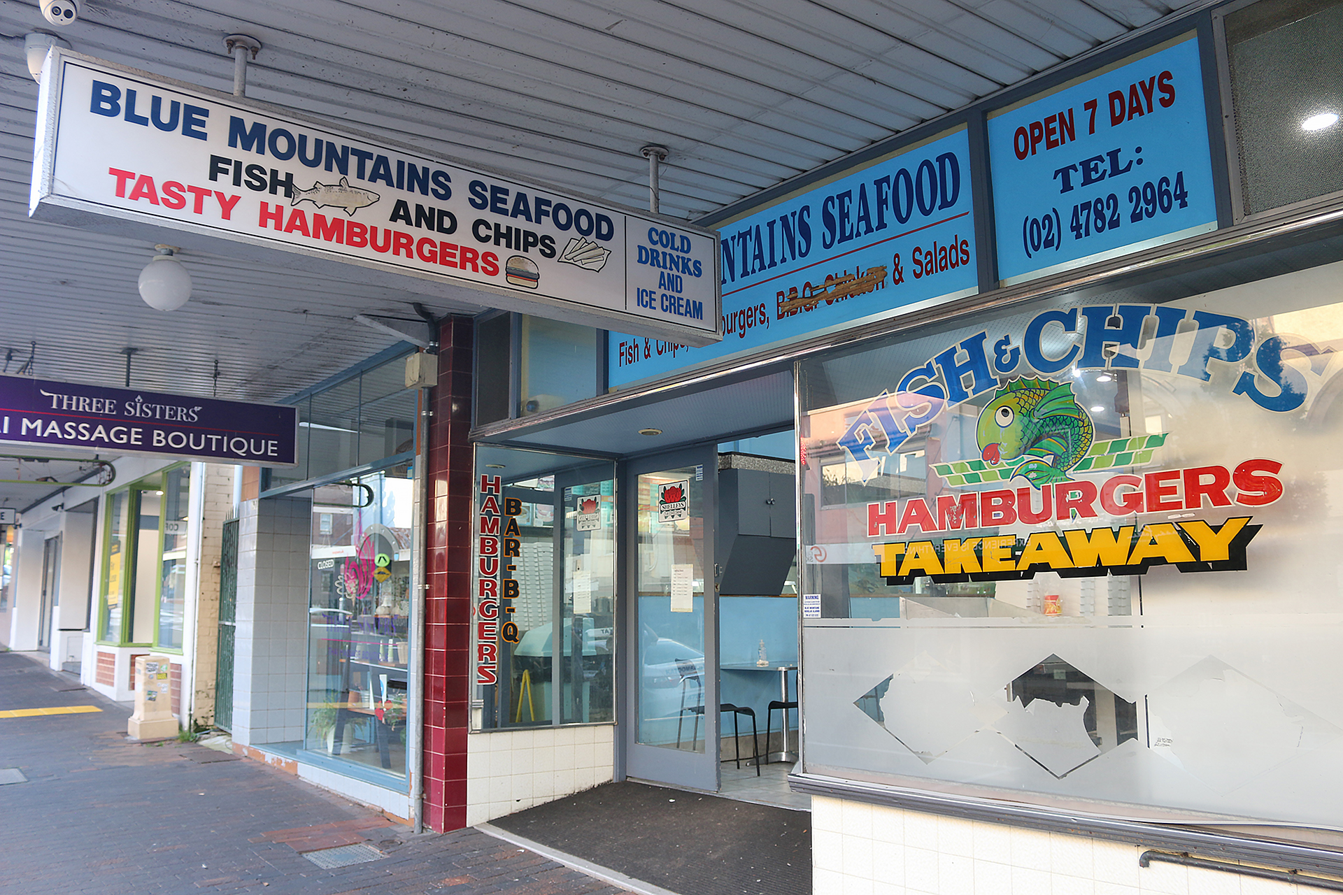 a storefront with signs and signs