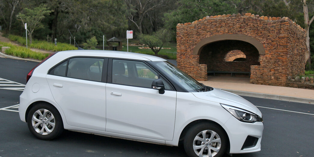 a white car parked on a road