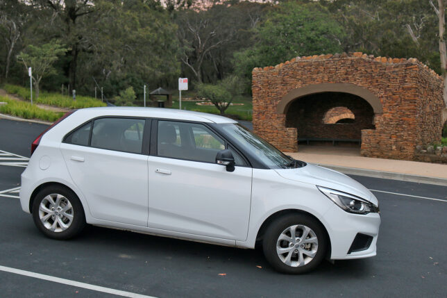 a white car parked on a road