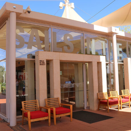 a building with chairs outside
