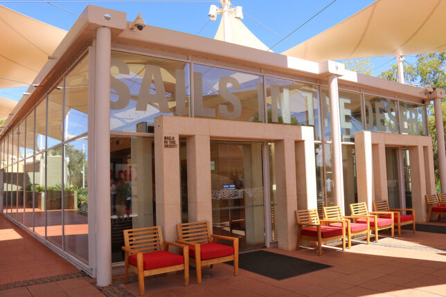 a building with chairs outside