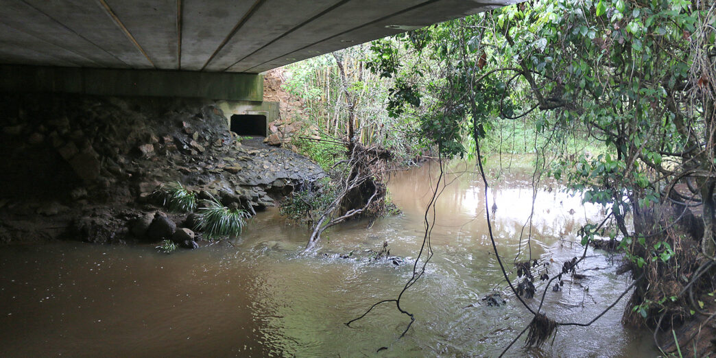 a river under a bridge