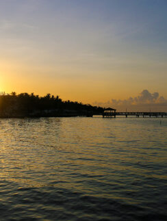 a sunset over a body of water