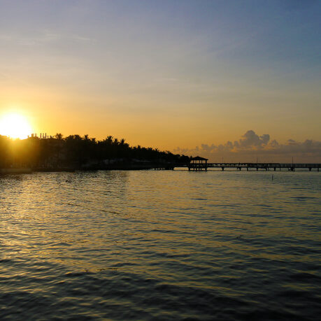 a sunset over a body of water