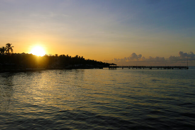 a sunset over a body of water