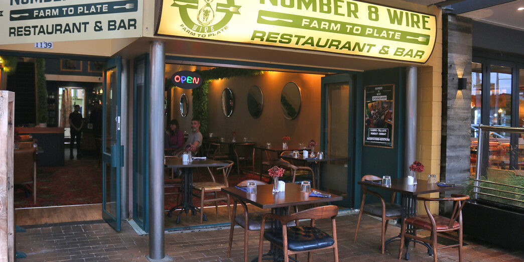 a restaurant with tables and chairs