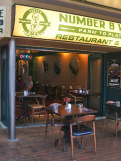 a restaurant with tables and chairs