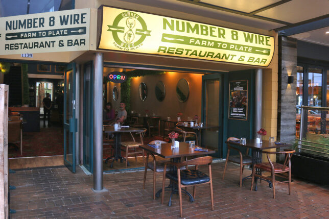 a restaurant with tables and chairs