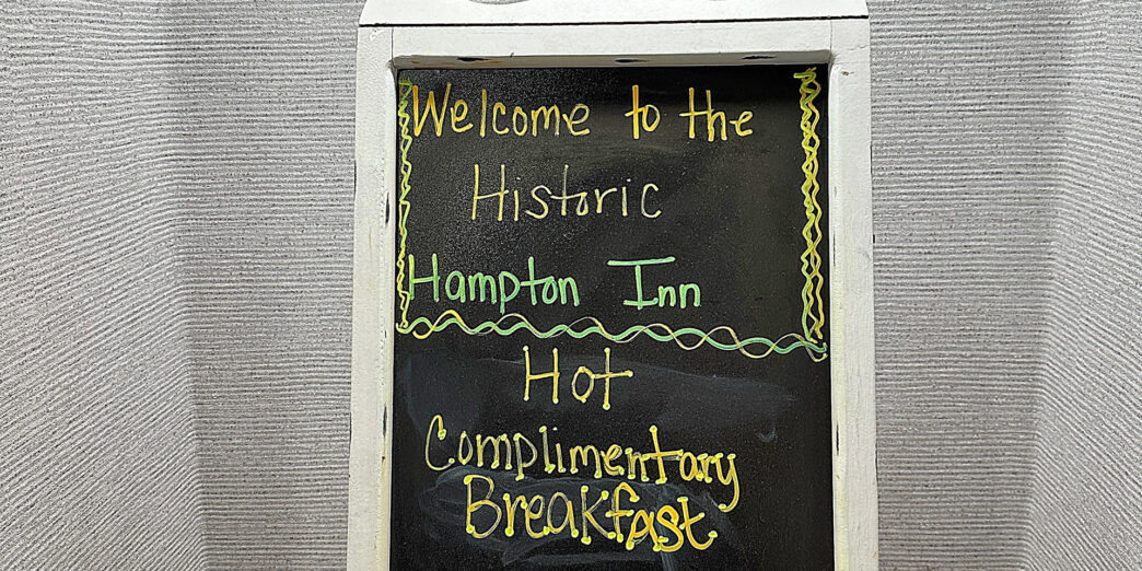 a chalkboard with yellow writing on it