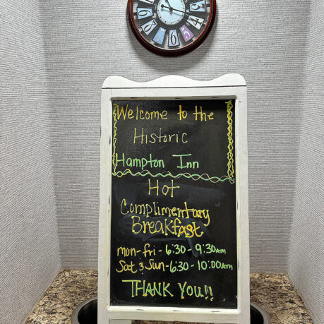 a chalkboard with yellow writing on it