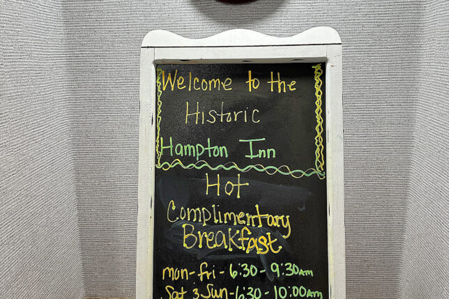 a chalkboard with yellow writing on it