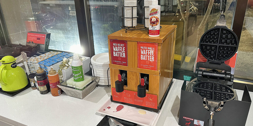 a machine with cups on top of it