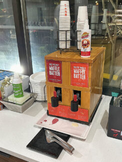 a machine with cups on top of it