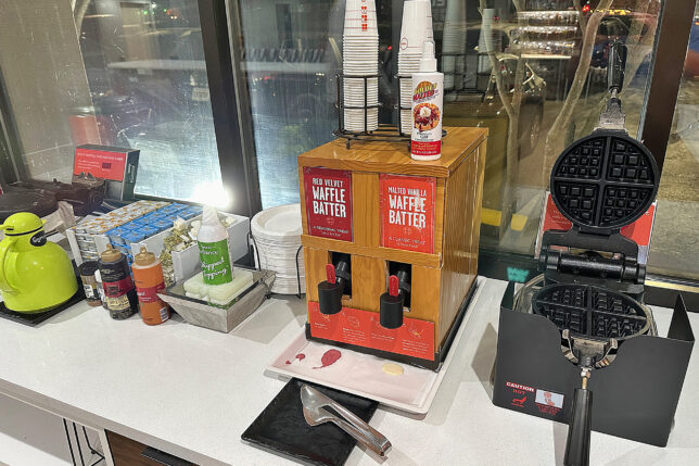 a machine with cups on top of it