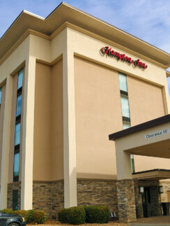 a building with a car parked in front of it