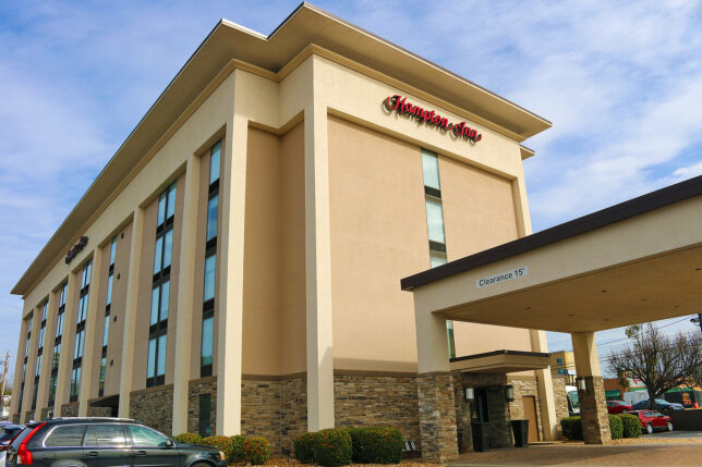 a building with a car parked in front of it