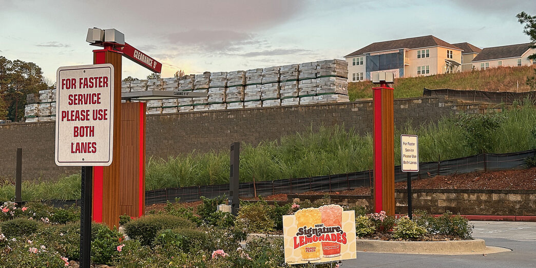 a sign in a parking lot