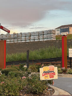 a sign in a parking lot