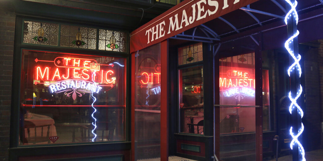 a restaurant entrance with a glass door