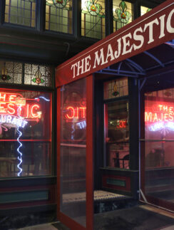 a restaurant entrance with a glass door