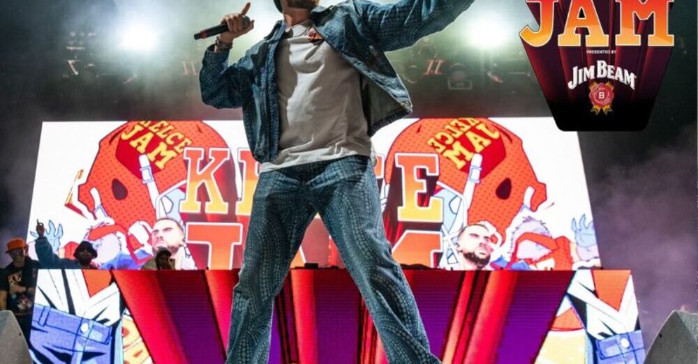 a man on a stage with a microphone