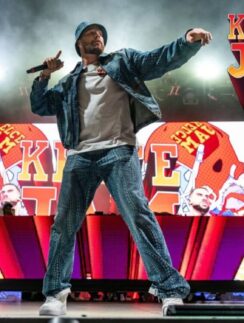 a man on a stage with a microphone