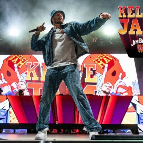 a man on a stage with a microphone