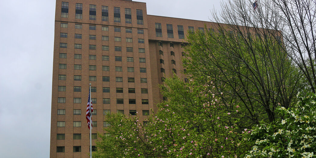 a building with a flag in front of it