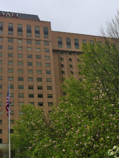 a building with a flag in front of it