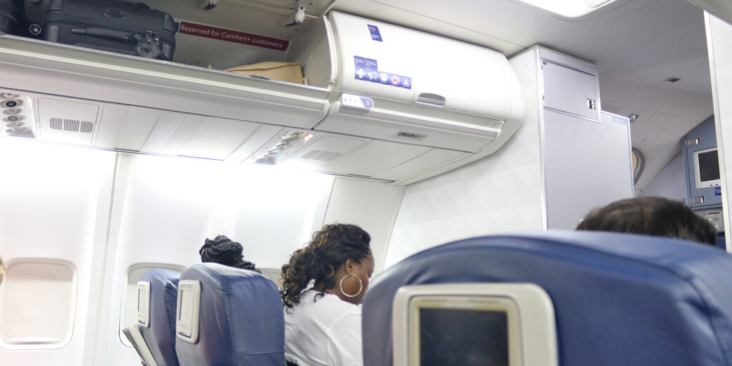 a woman sitting in a plane