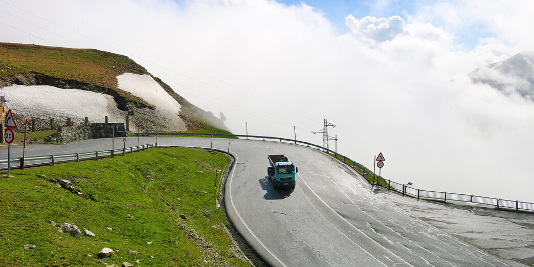 a truck driving on a road