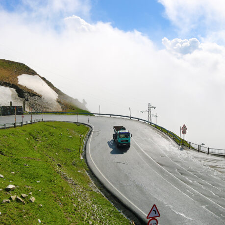 a truck driving on a road