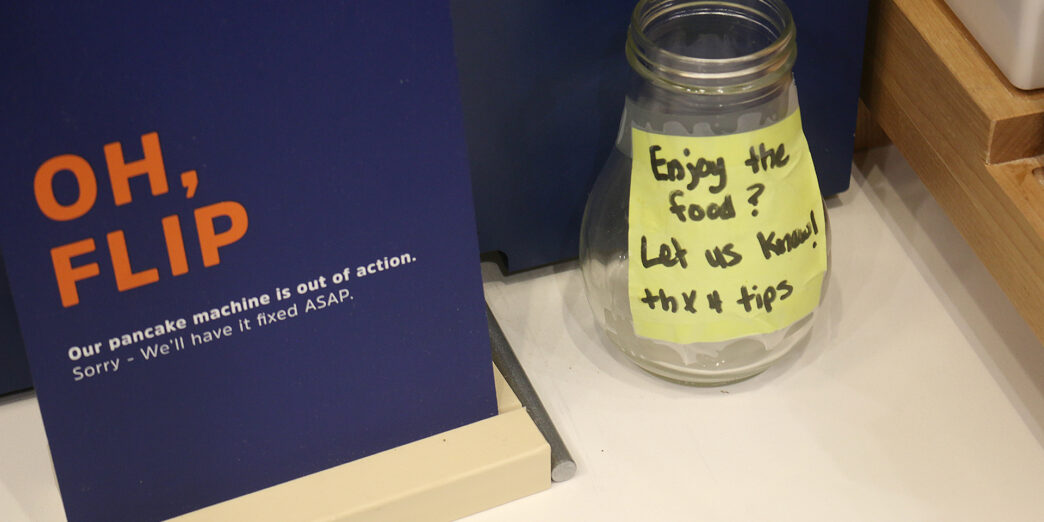 a glass jar with a note on it