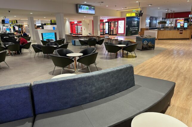 a large room with tables and chairs