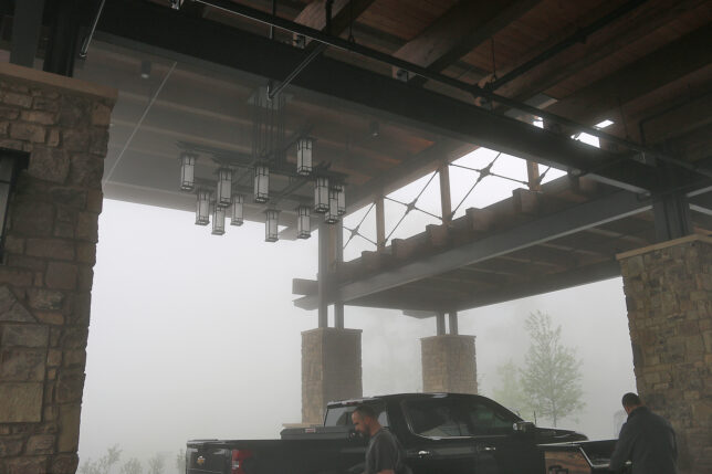 a man standing in a parking lot