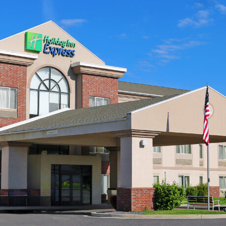 a building with a flag in front of it