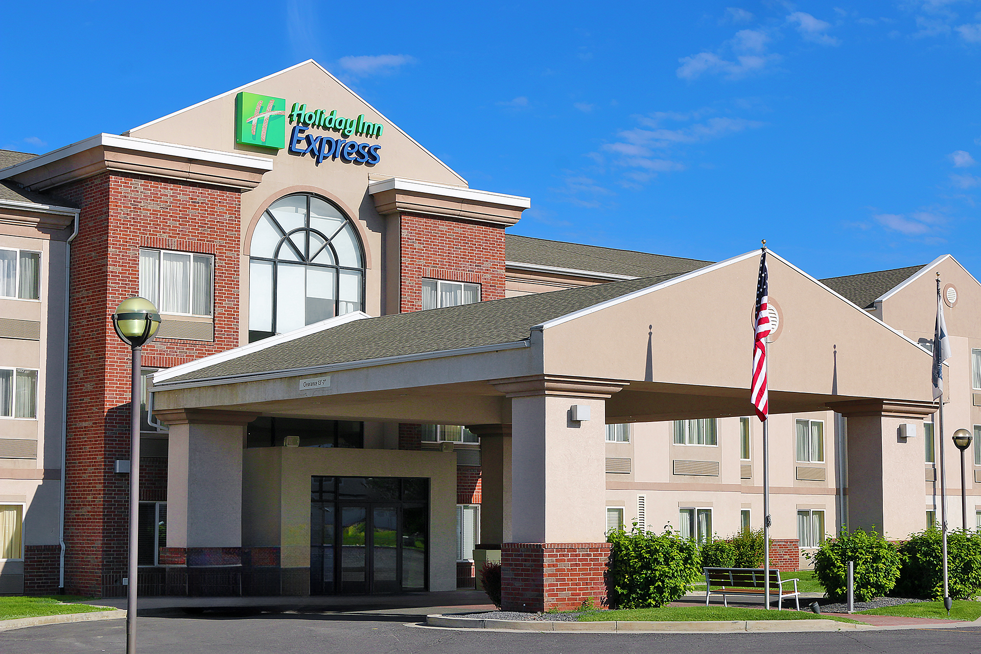 a building with a flag in front of it