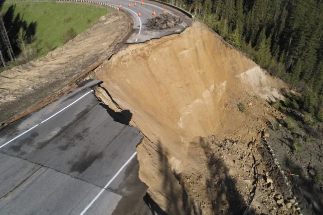 a road that has been eroded by a cliff