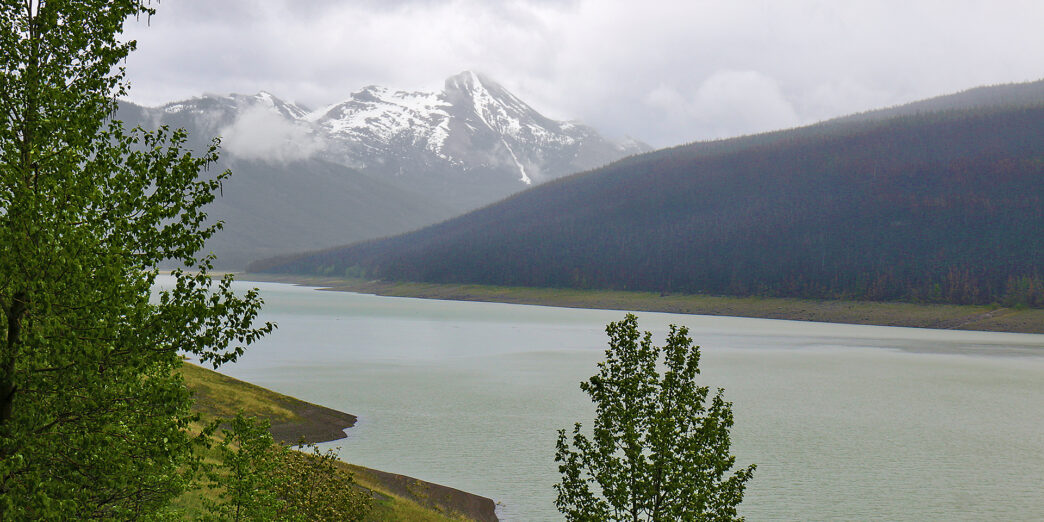 a lake surrounded by mountains