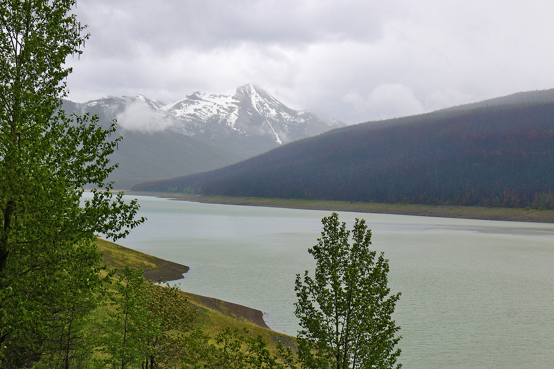 a lake surrounded by mountains