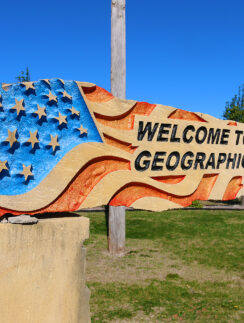 a sign with a flag on it