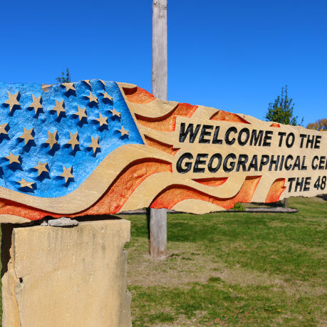 a sign with a flag on it