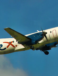 a plane flying in the sky