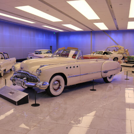 a group of cars in a room